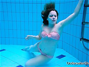 stellar woman shows fantastic bod underwater