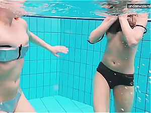 trio naked dolls have fun underwater